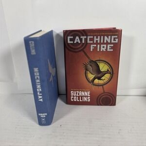 Mocking Jay and Catching Fire by Suzanne Collins Hardcovers One W Slipcover